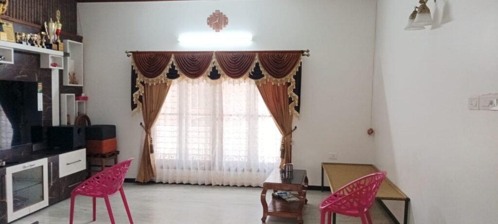 Premium curtains with valance and sheers in a Pollachi home