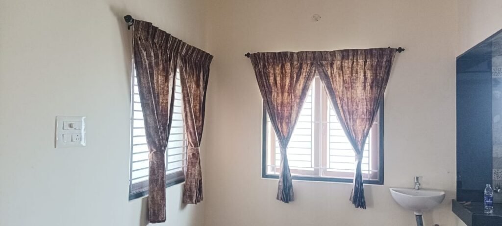 Textured curtains with tiebacks in a dining room